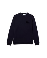 Sudadera azul marino de algodón con cuello redondo, mangas largas y puños acanalados. Presenta un logotipo negro bordado en el pecho.