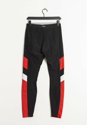 Leggings noirs avec des panneaux en rouge, blanc et noir sur les côtés. Fabriqués en tissu extensible ; texture lisse. Logo FIIL sur la taille.