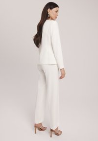 Makalu - Spodnie materiałowe