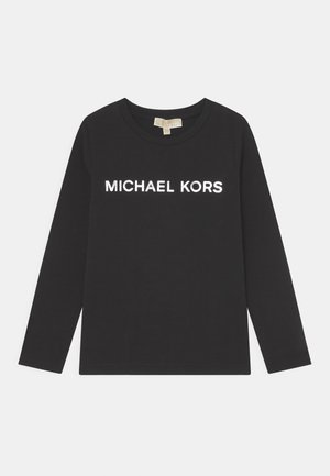 T-shirt noir à manches longues en coton, avec le texte "MICHAEL KORS" en blanc sur la poitrine. Col rond classique.