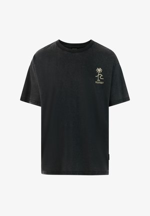 T-shirt noir à manches courtes en tissu doux, avec un petit logo palmier doré sur la poitrine et une coupe décontractée.