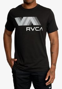 Black t-shirt with short sleeves featuring a white horizontal striped logo "VA" above "RVCA" in bold lettering. Soft fabric, casual fit.