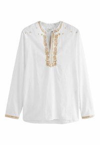 Camicia bianca a maniche lunghe con motivi floreali ricamati beige attorno al colletto, scollo, spalle e polsini, dotata di una chiusura frontale con bottoni.