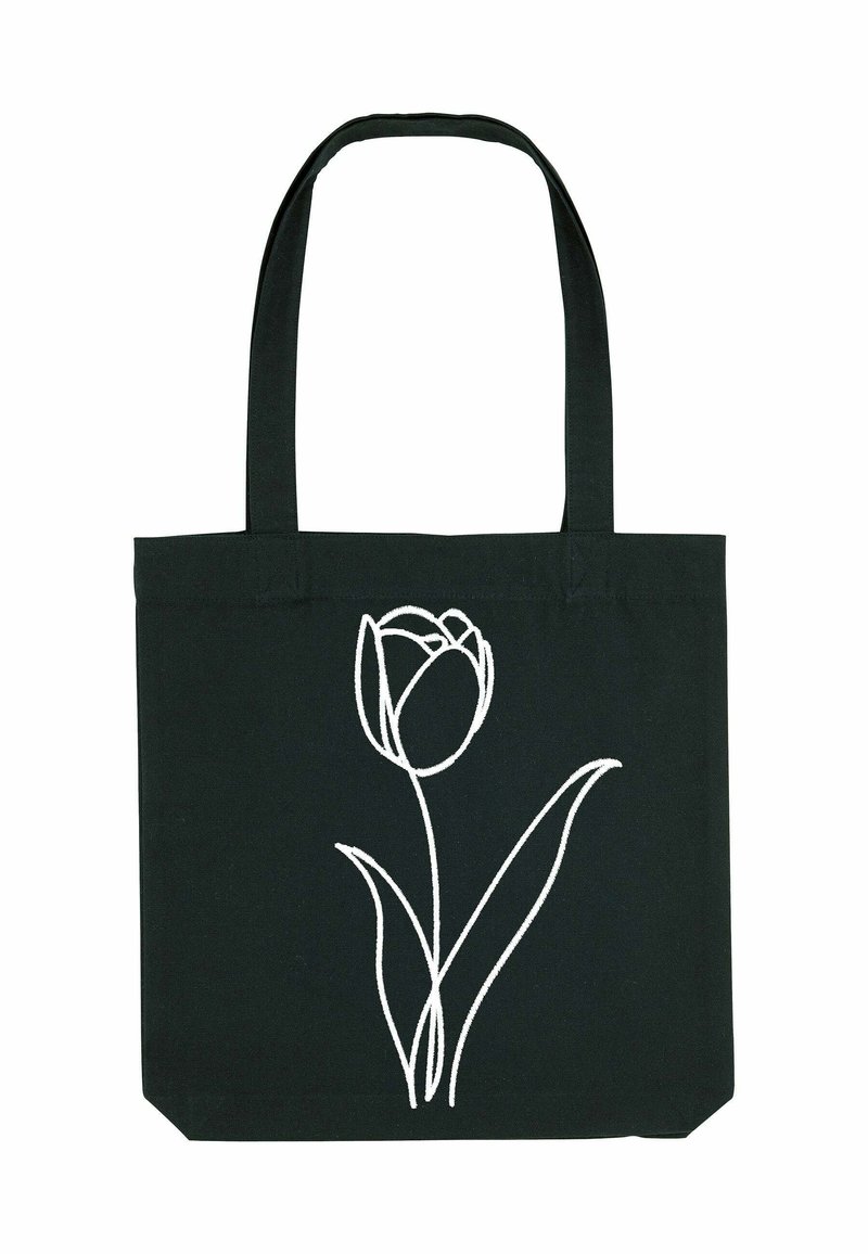 Zwarte tote bag met lange handvatten, voorzien van een eenvoudige witte lijntekening van een enkele tulp met twee bladeren aan de voorkant.