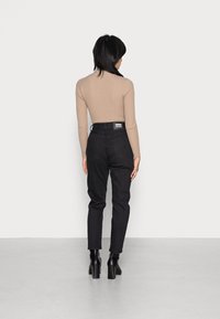 Dr.Denim Petite NORA  - Calças de ganga de corte relaxado - washed black stretch