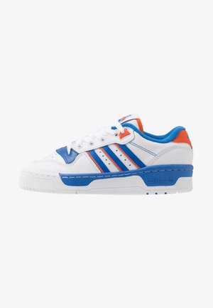 White Adidas sneaker with blue and orange accents, blue sole trim, lace-up design, and Adidas logo on the midsole and heel.