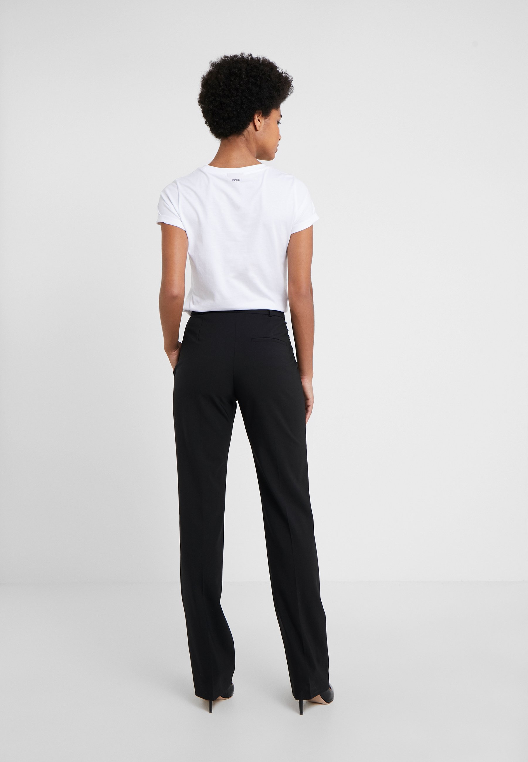 REGULAR TROUSERS - Trousers - black 