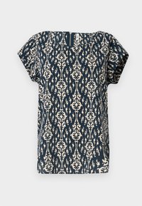 Mørkeblå kortermet bluse med et kremfarget blomster-damaskmønster. Har firkantet halsutskjæring og en subtil teksturert overflate.