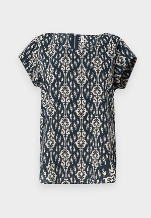 Blouse à manches courtes bleu marine avec un motif floral damassé crème. Présente un décolleté carré et un tissu texturé subtil.