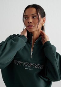 aim’n® VARSITY HALF - Felpa - deep emerald