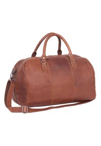 Borsa da viaggio in pelle marrone con due manici superiori, una tracolla staccabile e chiusura con zip. Presenta una texture liscia e cuciture sottili.
