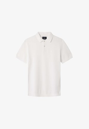 Valkoinen puuvillapaita, jossa on lyhyet hihat, kolmesta napista koostuva kaulus ja hillitty logo rintapielessä. Pehmeä rakenne ja tavanomainen istuvuus.