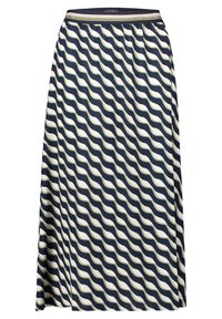 Jupe bleu marine et crème à motif ondulé, en tissu léger, avec une taille élastique et un design fluide.