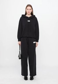 MM6 Maison Margiela Džemperis su gobtuvu - washed black