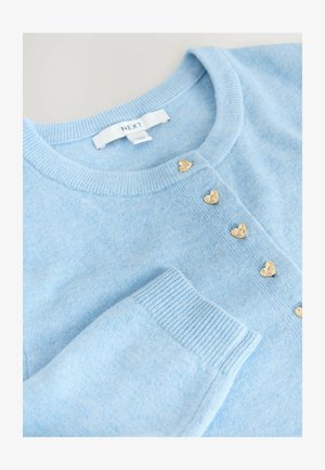 Cardigan azzurro chiaro in morbido tessuto a maglia con polsini a coste e cinque bottoni a forma di cuore dorati lungo la patta frontale.