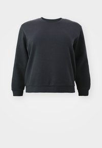 Svart genser med rund hals, lange ermer og ribbestrikkede mansjetter. Laget av en myk bomullsblanding, med en enkel, jevn tekstur.