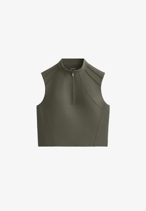 Mouwloos cropped top in olijfgroen, met een hoge kraag en een ritssluiting aan de voorkant. Gemaakt van gladde, lichte stof met subtiele naaddetails.