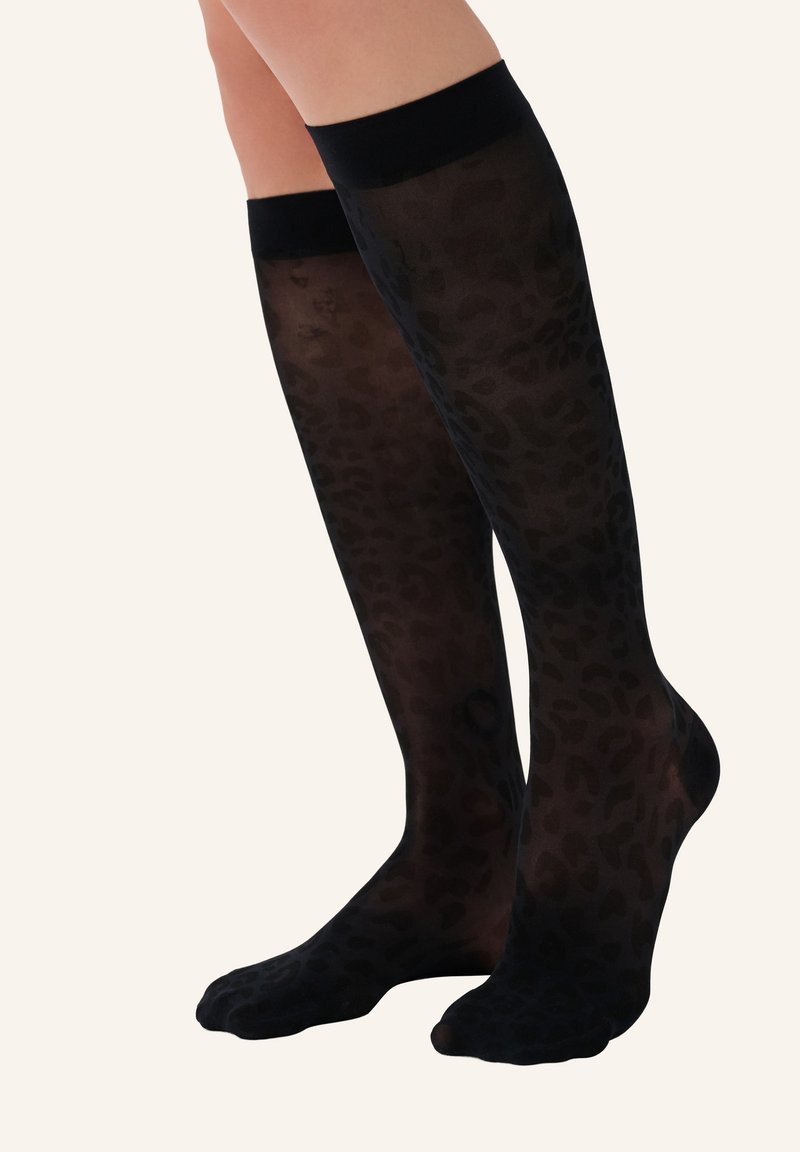 Black semi-sheer knee-high socks with a leopard print pattern, featuring a solid black cuff and a smooth, texture.