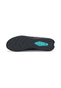 Semelle de chaussures de sport noire avec une surface texturée. Présente un accent turquoise au centre et un motif de crans en zigzag pour une meilleure adhérence.