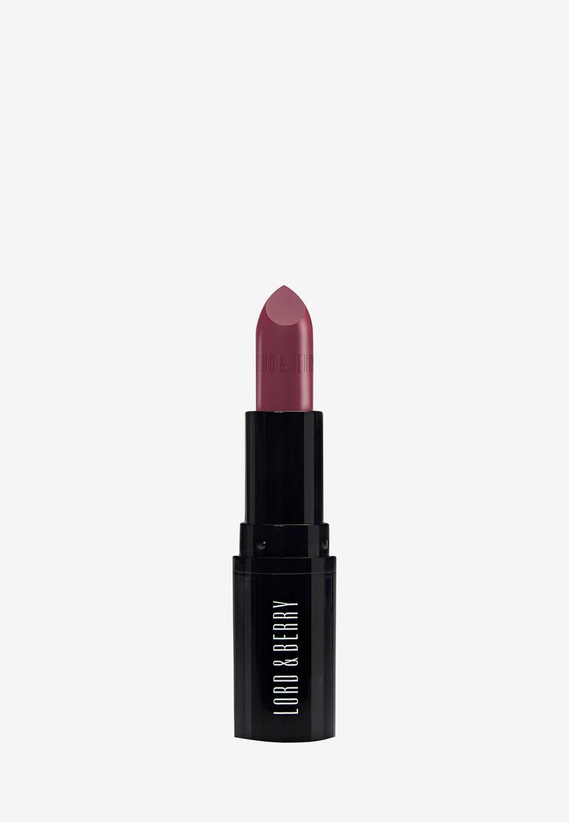 Lippenstift in einer schwarzen Tube mit einer spitzen Spitze. Die Farbe ist ein sanftes Mauve. Die Verpackung zeigt weiße Textmarken. Glatte Textur.