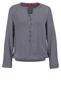 Blouse bleu marine à manches longues avec motif blanc géométrique en forme de losanges, col rond et patte de boutonnage à l'avant.