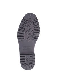 Suola di scarpa in gomma nera con superficie texturizzata, caratterizzata da un motivo di battistrada a esagoni e linee per migliorare la presa; contrassegnata con la misura 36.