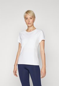 White athletic t-shirt with short sleeves, featuring mesh side panels and a round neckline, made from lightweight, breathable fabric.