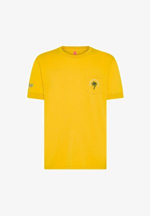T-shirt in cotone giallo con maniche corte, colletto tondo, taschino sul lato sinistro del petto con una grafica di palma e testo del marchio in bianco.