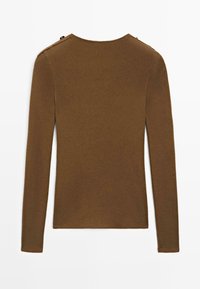 Brown long-sleeve top made of a smooth knit fabric, featuring shoulder snaps and a rounded neckline with a fitted silhouette.
