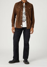 Wrangler Tygbyxor - black