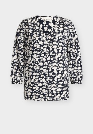 Donkerblauwe blouse met wit bloemmotief, V-hals, lange mouwen met elastische boorden en knoopsluiting aan de voorkant, maat 36.