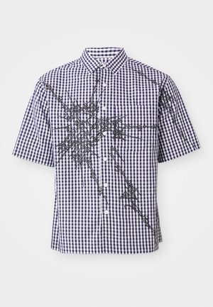 Short-sleeve button-up shirt with navy and white gingham pattern and irregular black abstract graphic lines across front and sleeves.
