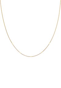 Collier en chaîne dorée avec de petits accents circulaires, au design délicat et fin, et à la texture lisse tout au long.
