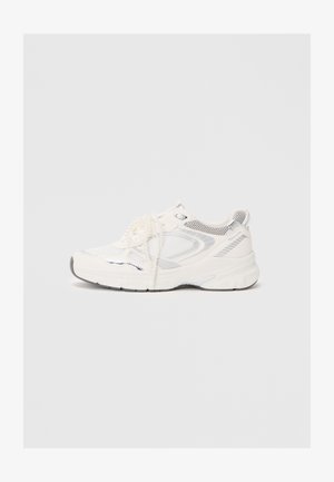 White athletic shoes with a mesh upper, metallic accents, textured sole, and a minimalist design. Features adjustable laces.