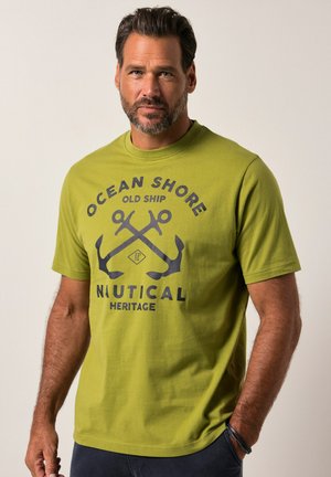 Olive green cotton T-shirt featuring a navy graphic of crossed anchors and text. Short sleeves and a crew neckline. Smooth texture.