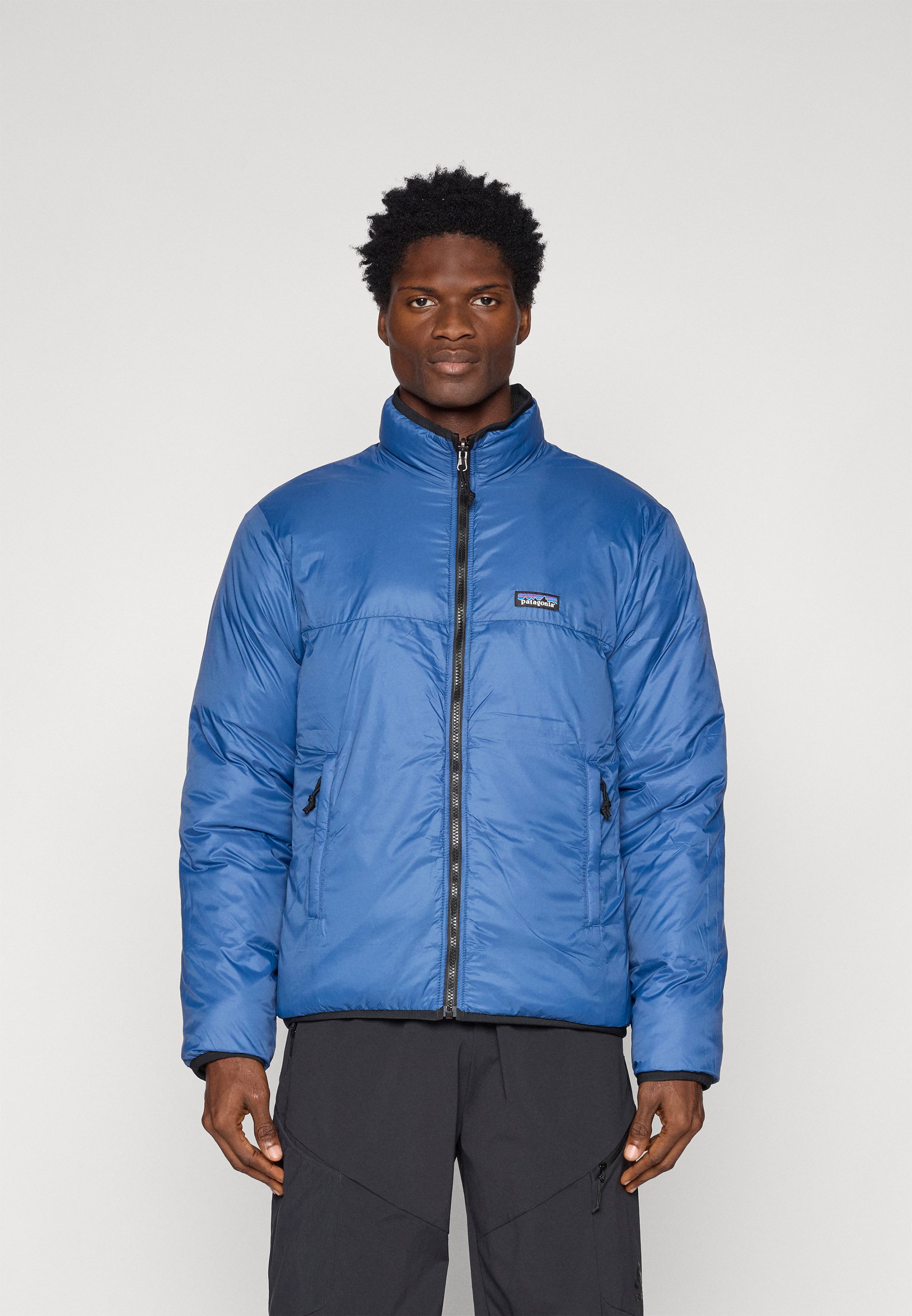 Patagonia REVERSIBLE BETTER SWEATER - Down jacket - black - Zalando