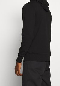 Ellesse Jersey con capucha - black