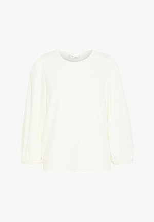Hvid bluse med lange ærmer, rund halsudskæring og struktureret stof. Har samlede, puffede ærmer og en lige kant.