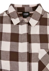 Chemise à carreaux marron et blanc, boutonnée, avec col pointu et poche poitrine, taille XS de la marque Urban Classics.