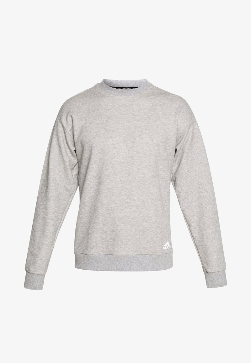 Sweat-shirt gris clair Adidas à col rond, manches longues, poignets et ourlet côtelés, avec petit logo blanc Adidas près du bord inférieur.
