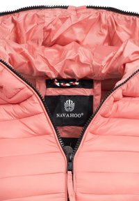 Coral puffer jacket featuring a zip closure, quilted design, and black lining. The label displays "NAVAHOO" with a decorative logo.