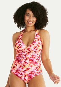 Baddräkt med halterneck i ett rosa blommönster som har röda och orange detaljer, tillverkad av ett smidigt, stretchigt material.