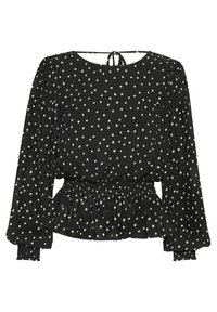 Blusa nera con pois bianchi, scollatura rotonda, maniche lunghe a sbuffo, vita smock e orlo a peplo arricciato. Fiocchi sul collo sul retro.