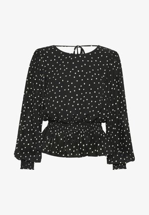 Juoda bliuska su baltais taškeliais, apvaliu iškirpimu, ilgomis pūstomis rankovėmis, raukšlėtu liemeniu ir susiraukšlėjusiu peplumu. Kaklo gale kaspinas.