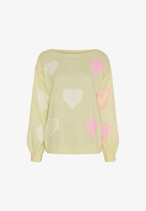 Gul striktrøje med afslappet pasform, prydet med forskellige hjerter i hvid og pink. Inkluderer lange ærmer med tætsiddende manchetter.