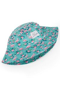 Bucket hat in teal fabric featuring a pink flamingo and floral pattern, with a wide brim, soft texture, and a stitched label.