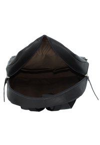 Black leather backpack with a zip closure. Interior features a smooth brown lining and organizational pockets. Sturdy construction.