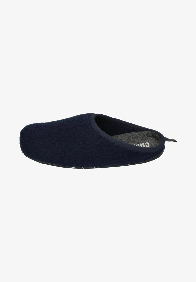 Navy blue wool slipper with a soft texture, rounded toe, and a black rubber sole. Features a fabric lining and a heel loop for easy wear.