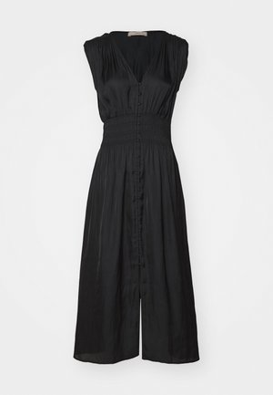 Abito nero con scollo a V, maniche corte e vita smock. Presenta una chiusura con bottoni sul davanti e una gonna fluida che arriva fin al ginocchio. Tessuto morbido.