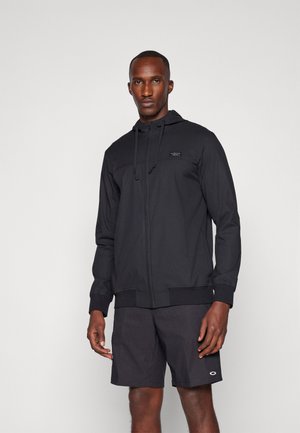 TravisMathew WANDERLUST HOODIE - Training jacket - black